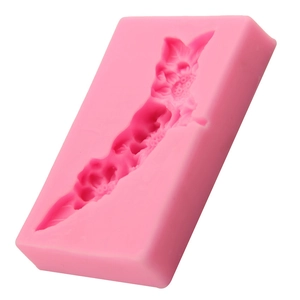 Pink silicone mold featuring three floral patterns for fondant and DIY baking cake decor