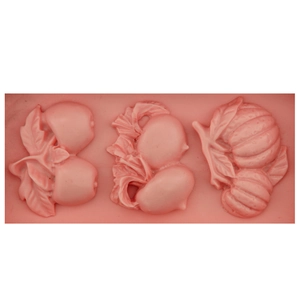 Pink silicone DIY baking mold featuring apple, peach, and pumpkin relief designs