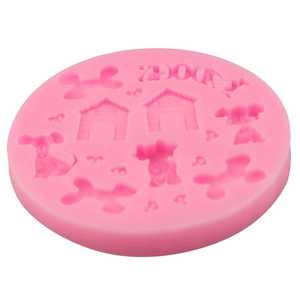 Pink silicone mold with dog house and bone shapes for fondant and cake baking