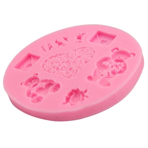 Pink silicone mold featuring bears, hearts and I Love You text for fondant and chocolate