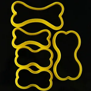 5-piece yellow bone-shaped plastic cookie cutters for DIY baking and fondant cakes