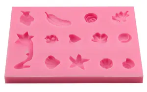 Moule en silicone rose avec formes de plumes et coquillages pour décorations de gâteau