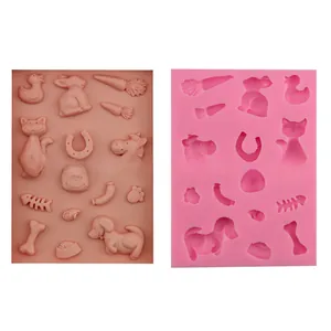 Pink silicone mold detail showing rabbit duck and cat shapes for DIY fondant baking