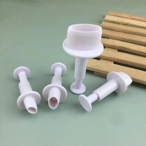 Set of 4 white plastic oval plunger cutters for fondant and cookie dough embossing