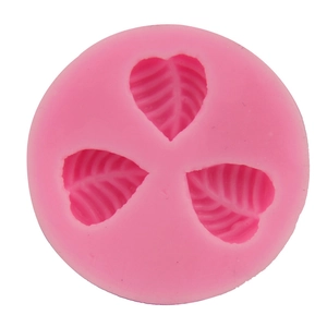 Pink round silicone mold featuring three leaf-shaped cavities for DIY cake baking decoration