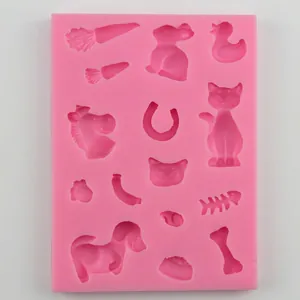 Pink silicone animal fondant mold with rabbit, duck and fish bone shapes for DIY baking