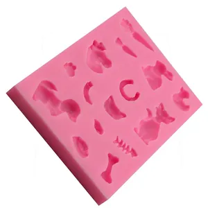 Pink silicone animal-themed baking mold with rabbit, cat, and carrot shapes for fondant cake