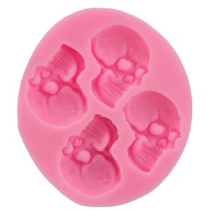 Pink silicone skull mold with four cavities for DIY baking fondant or resin crafts