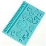 Detailed blue silicone fondant mat with embossed rose patterns and leaf textures