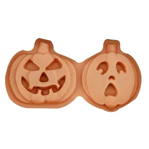 Dual cavity Halloween pumpkin silicone mold for chocolate and cake baking in bright orange