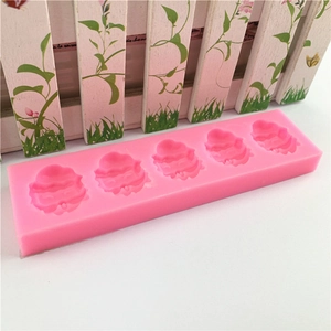 Pink silicone Santa Claus head fondant mold with 5 cavities for DIY cake decorating