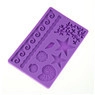 Macro shot of purple silicone fondant mold with detailed sea shells and coral patterns