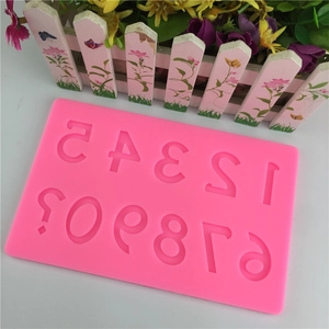 Pink silicone fondant mold with Arabic numbers 0-9 for DIY cake decorating and baking