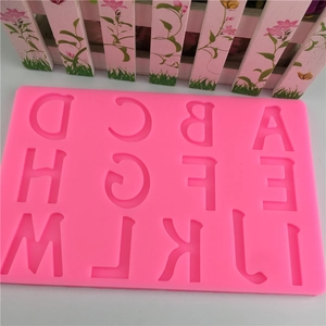 Pink silicone alphabet mold for fondant cake decorating featuring letters A to M
