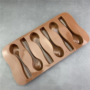 Brown 6-cavity spoon shaped silicone mold for DIY chocolate baking and pastry