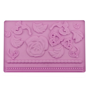 Pink silicone fondant mold featuring rose, leaf patterns and beaded border for cake DIY
