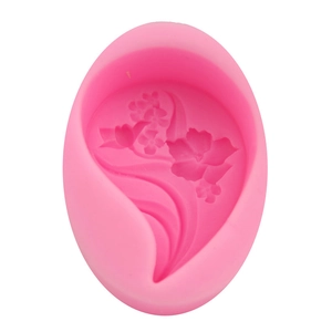 Pink silicone mold with flower and wave patterns for baking and DIY soap making