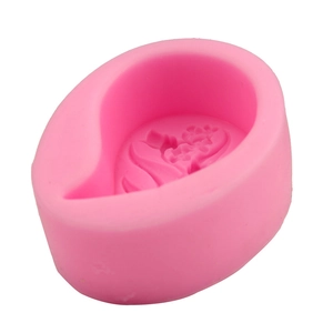Pink silicone leaf and flower mold for DIY cake baking and candle making projects