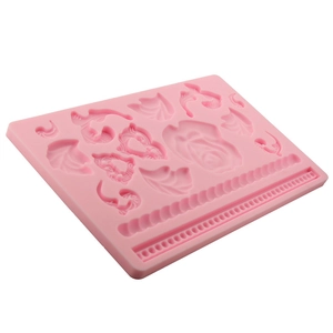 Pink silicone fondant mold with floral leaf patterns for DIY cake decorating and crafts