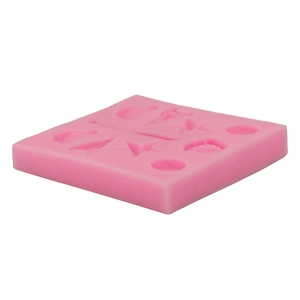 Pink silicone mold featuring seashell and starfish shapes for DIY fondant and baking