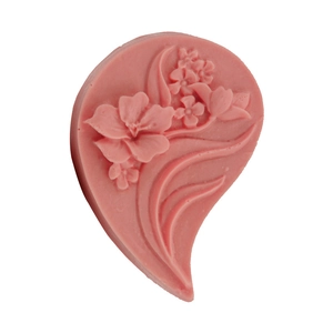 Detail of pink leaf and flower silicone mold showing 3D embossed floral patterns