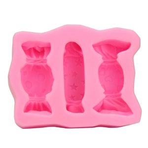 Pink candy silicone mold with polka dot, star and heart patterns for DIY baking