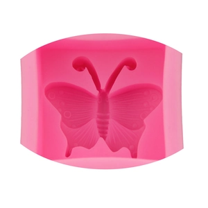Close-up of pink 3D butterfly silicone mold for DIY cake fondant and soap crafting