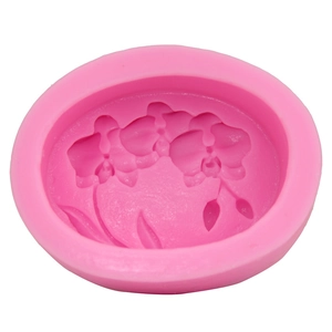 Pink silicone mold featuring lotus flower patterns for cake baking and DIY soap making