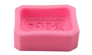 Pink silicone cake mold with 12 rose flower patterns for DIY baking and handmade soap