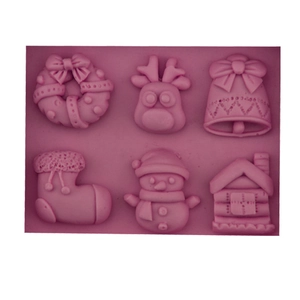 Pink silicone Christmas mold with reindeer, snowman, and bell patterns for DIY baking