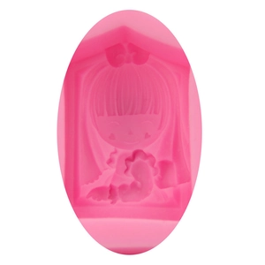 Close-up of pink silicone mold with detailed cartoon girl engraving for DIY baking