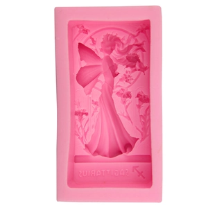 Pink silicone mold featuring an angel fairy design and Sagittarius zodiac text engraving