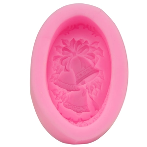 Pink silicone Christmas bell mold for DIY fondant baking and holiday soap crafts