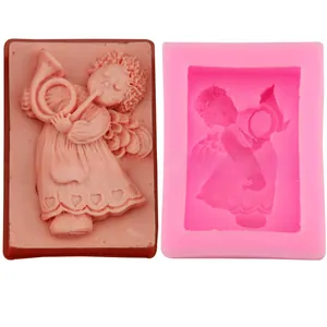 Macro detail of trumpet-playing angel silicone mold for DIY baking and handmade soap making