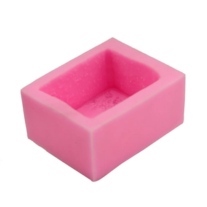Pink rectangular silicone mold for soap and chocolate with decorative floral patterns
