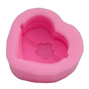 Pink heart-shaped silicone mold with floral pattern for 3D cake baking and DIY soap making