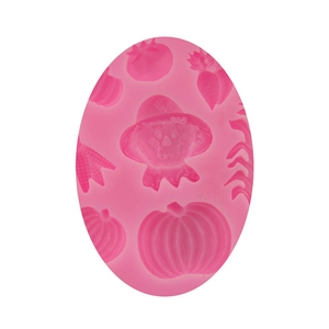 Detailed pink silicone mold with 3D pumpkin and scarecrow patterns for cake decorating