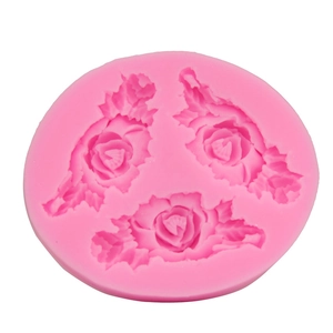 Pink silicone mold featuring three rose flower shapes for baking and DIY crafts