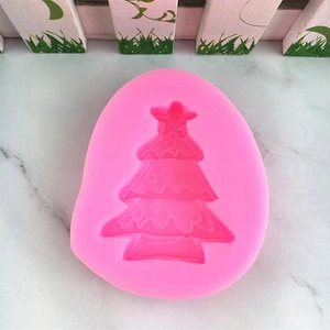 Pink silicone Christmas tree cake mold for DIY baking and handmade soap making crafts