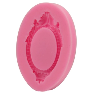 Detailed pink silicone mold featuring a vintage oval lace mirror frame relief pattern