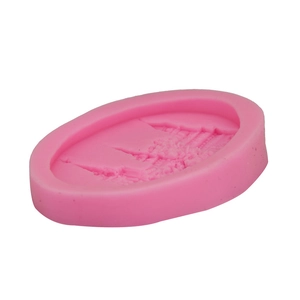 Detailed macro view of pink silicone mold with European castle relief for baking and soaps