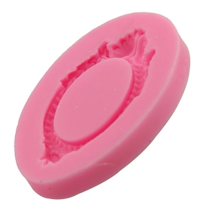 Pink silicone fondant mold with oval vintage embossed pattern for DIY cake decorating