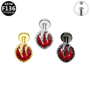 G23 titanium labret stud with red gemstone and bat wing design in three metallic colors