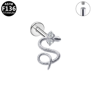 Detailed macro view of F136 titanium snake labret with internal thread and zircons