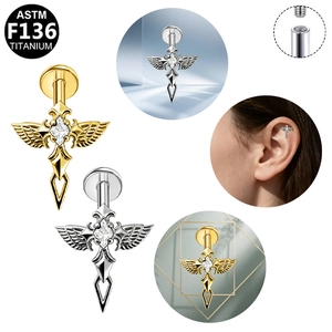 Macro detail of G23 titanium cross cartilage stud with zircon wing and internal thread