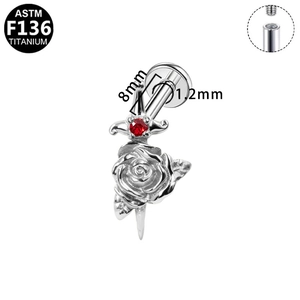 Detailed macro view of F136 titanium rose and dagger labret stud with 8mm length size specs