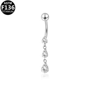 Macro view of ASTM F136 titanium belly ring featuring three teardrop zircon pendants