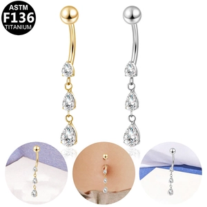 Detail of ASTM F136 titanium belly ring with three teardrop-shaped zircon stones