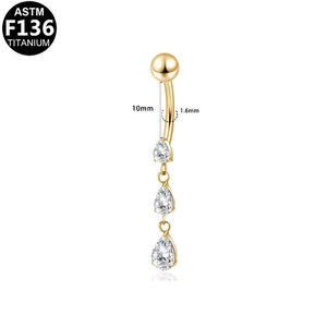 Macro detail of F136 titanium belly ring with triple pear-shaped cubic zirconia drops