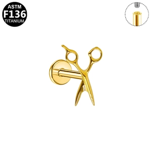 Detailed macro view of golden ASTM F136 titanium scissor stud with internal threading